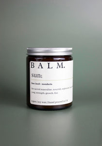 Packaged in an opaque recyclable glass jar and aluminium lid, the Balm Wellness Sun candle was created as an ode to life energy; honouring strength, growth, nourishing, and replenishing. Scent notes: Subtle, light, fruity. Top notes of lime and orange zest, heart of geranium and thyme and base notes of moss and patchouli. 