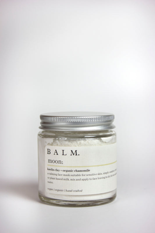 Packaged in a recyclable glass jar with an aluminium lid, the Moon Clay Face Mask by Balm Wellness is white in colour andcombines kaolin clay and organic chamomile powder to soothe, nurture and revitalise sensitive skin.
