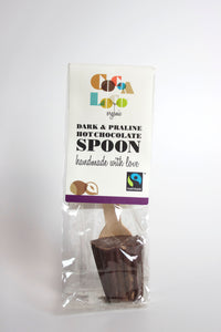 This Fairtrade Dark Chocolate & Praline Spoon is wrapped in a clear plastic packaging, with a cardboard colourful label 